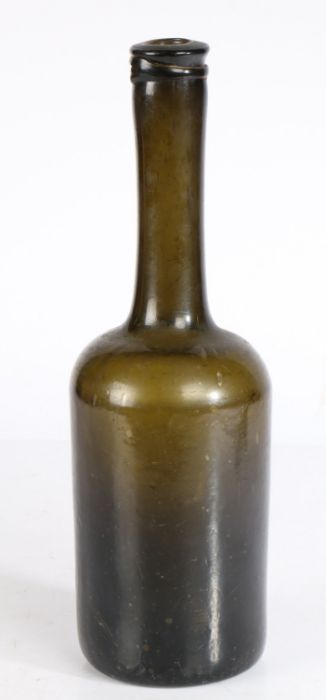 An unusual early 19th century bottle, circa 1800 The ring top above a long neck and cylindrical