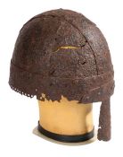 A Viking period 9th-10th century iron helmet Made of four arched panels and a crossed band, the edge