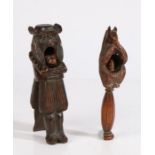 WITHDRAWN A late 19th century treen nut cracker, Swiss, circa 1880 Designed as a squirrel eating a