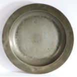 A George III pewter plain rim deep dish, Scottish, circa 1775 Hammermarks to rear of booge, and