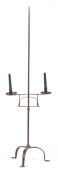 A floor-standing iron adjustable candle stand The end-pointed stem with a dual adjustable