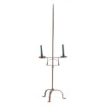 A floor-standing iron adjustable candle stand The end-pointed stem with a dual adjustable