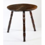 An interesting George III ash cricket table, circa 1800 Having an impressive thick and near one-