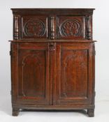 An unusual and small Charles II oak cupboard, North Wales, circa 1670 Having a recessed cupboard,