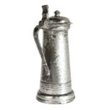 A good James I pewter flagon, circa 1610-20 The tapering drum with single narrow fillet below collar