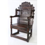 An extraordinary James I joined oak double panel-back open armchair, probably Welsh, dated 1624