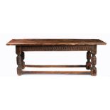 An oak refectory-table, English Elements 17th century, having a fully-cleated twin-plank top,