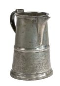 A George III pewter half-gallon lidless ale jug, circa 1800 The truncated cone body with mid-fillet,