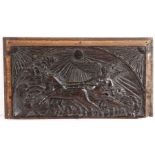 An 18th century carved oak panel Designed with a winged rider on a horse drawn chariot, below a