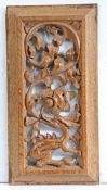 A 16th century carved oak panel Carved and pierced in high-relief, designed with dragon issuing