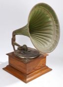 A gramophone, with green painted tin horn