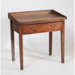 19th century side table, having mahogany top with elm gallery, raised on a pine base fitted single