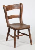 Victorian country elm bar back child's chair, raised on ring turned legs, 61cm high