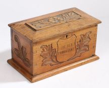 Late Victorian golden oak box, made from the timber of HMS Foudroyant, the hinged lid carved with