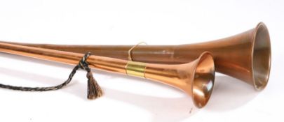 Copper and brass hunting horn, 90.5cm long, brass hunting horn in two sections, 134.5cm long (2)