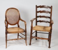 Country elm ladderback open elbow chair, with woven rush seat, together with a beech cane backed and