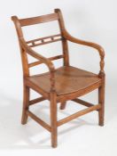 19th century Suffolk ball back carver chair, with elm seat, 84cm high