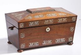 Victorian rosewood and mother of pearl inlaid tea caddy, of sarcophagus form, the hinged lid centred