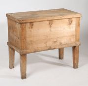 Country stripped pine chest, the hinged lid enclosing a plain interior, raised on four block legs,