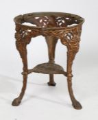 Victorian cast iron table base, with face mask motif's and grape and vine frieze and legs, raised on