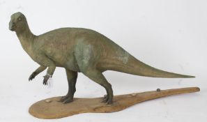 An Iguanodon Dinosaur model, ex Natural History Museum, London, 104cm width