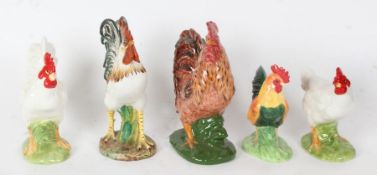 Border Fine Arts porcelain 'Cockerel' A4597, together with four further ceramic chickens/