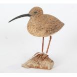 A small wooden carving of a wading bird, 16cm height