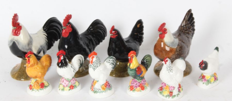 Group of six Michael Sutty porcelain chickens together with four further ceramic cockerels, all