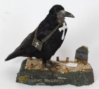Taxidermy uncased Anthromorphic Rook dressed as a parson, on a naturalistic base, 32cm height