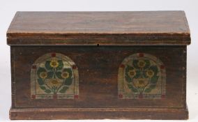 A 19th Century painted pine coffer, with flowers painted to the hinged top above a front panel