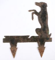 A sheet metal boot scraper, depicting a dog on its hind legs, 41cm long