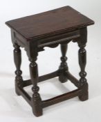 A Charles I and later oak joint stool, the base circa 1630, the later rectangular top above