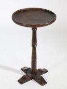A 19th Century and later beech and oak occasional table, the 19th Century beech circular dish top