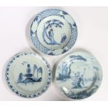 Three 18th Century Delft plates, circa 1740/1750, an English example painted in blue with a shepherd