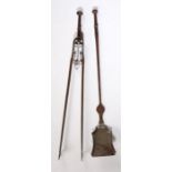 A matched pair of early 19th Century fire irons, with a shovel and a pair of tongs, the shovel