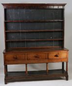 A Welsh late 18th Century oak dresser and rack, circa 1770-1800, Carmarthenshire, the concave