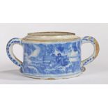 An 18th Century Delft twin handled posset, decorated with an Oriental landscape scene, lacking the