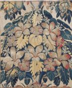 A 17th Century verdure tapestry fragment, with leaves and fruits, mounted, 41cm x 51cm Ex Mary