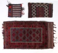 Three Sumak bags, one set with a double cross border, with a red blue and cream ground (3)