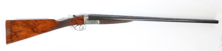 A William Ford 12 bore boxlock side by side ejector shotgun, with 28" barrels, scroll engraved