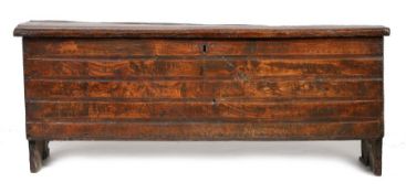 A Charles I oak and elm coffer, circa 1630, West Country, the rectangular top with run-moulding