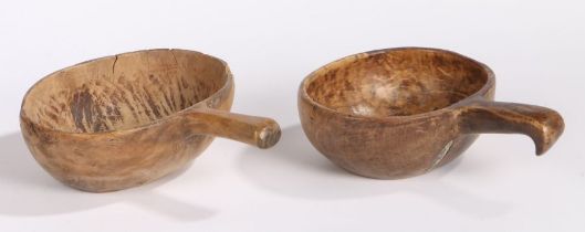 Two 19th Century Swedish scoops, each with a bowl and shaped handle, dated 1866 H. Kveen and 1846