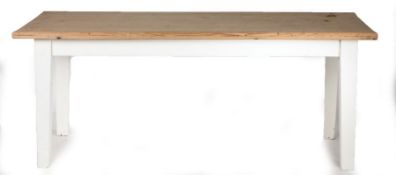 A pine kitchen table, the rectangular top above white painted tapering legs, 200cm long, 79cm