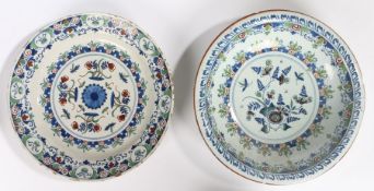 An 18th Century Delft shallow bowl, with green, red and blue foliate sprigs, 34cm diameter, together