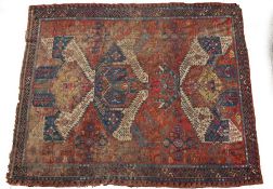 A Bergama Anatolian rug, set with linked "S" design throughout and pinwheel motifs, with a red