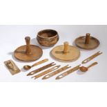 Treen, to include two spoons, sewing tools, a bowl and three rubbers, (11)
