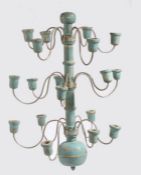 A Swedish blue painted chandelier, with a central turned column and S shape arms, 55cm high