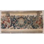 A 17th Century tapestry table runner fragment, with a centre bust with ribbons and dancing figures