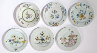 A collection of 18th Century English Delft, to include three Liverpool polychrome examples decorated