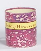 A 19th Century Sunderland lustre tankard/mug, in pink with the name Jean Henderson, crack to rim,